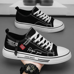 Chaussures décontractées hommes toile chaussures hommes baskets respirant hommes chaussures de sport noir tissu chaussure tendance lettre hommes chaussure coupe basse Sneaker