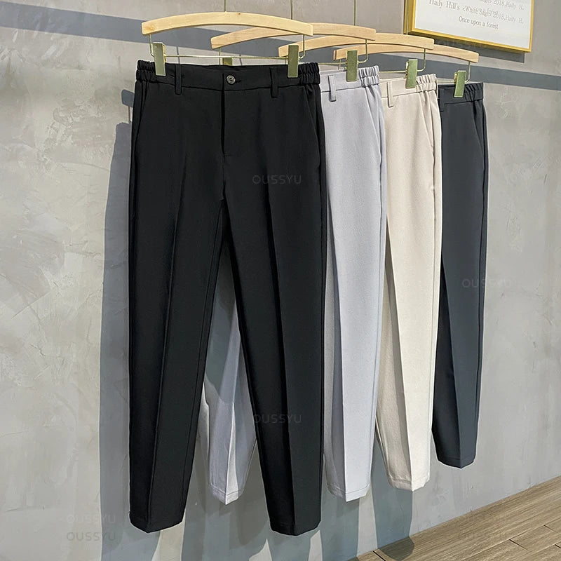 2025 printemps hommes pantalons décontractés costume pantalon coupe ajustée travail taille élastique Jogging affaires pantalon mâle noir grande taille 40 42