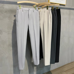 2025 printemps hommes pantalons décontractés costume pantalon coupe ajustée travail taille élastique Jogging affaires pantalon mâle noir grande taille 40 42