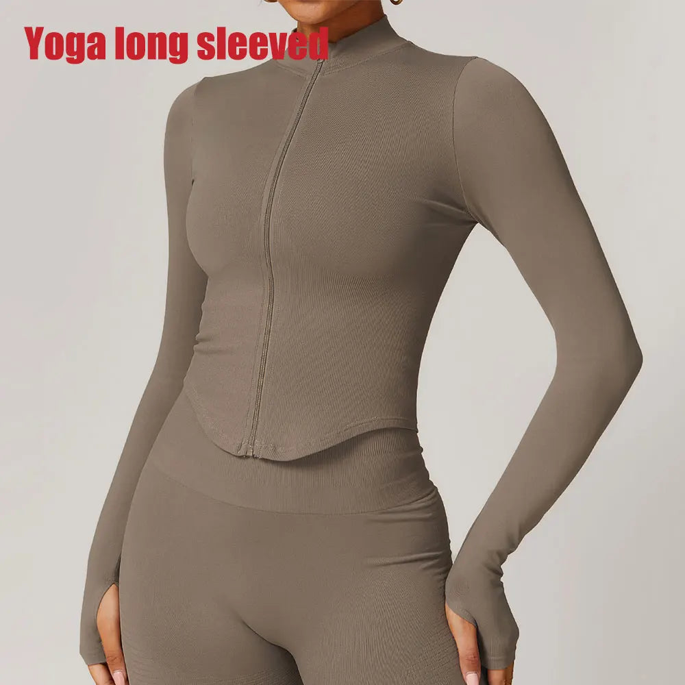 Veste à fermeture éclair pour femmes, haut court, T-shirts de Yoga, haut de Sport solide, chemises de course à manches longues, Sexy, séchage rapide, Fitness, vêtements de Sport
