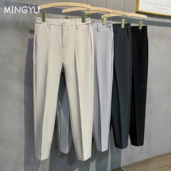 2025 printemps hommes pantalons décontractés costume pantalon coupe ajustée travail taille élastique Jogging affaires pantalon mâle noir grande taille 40 42