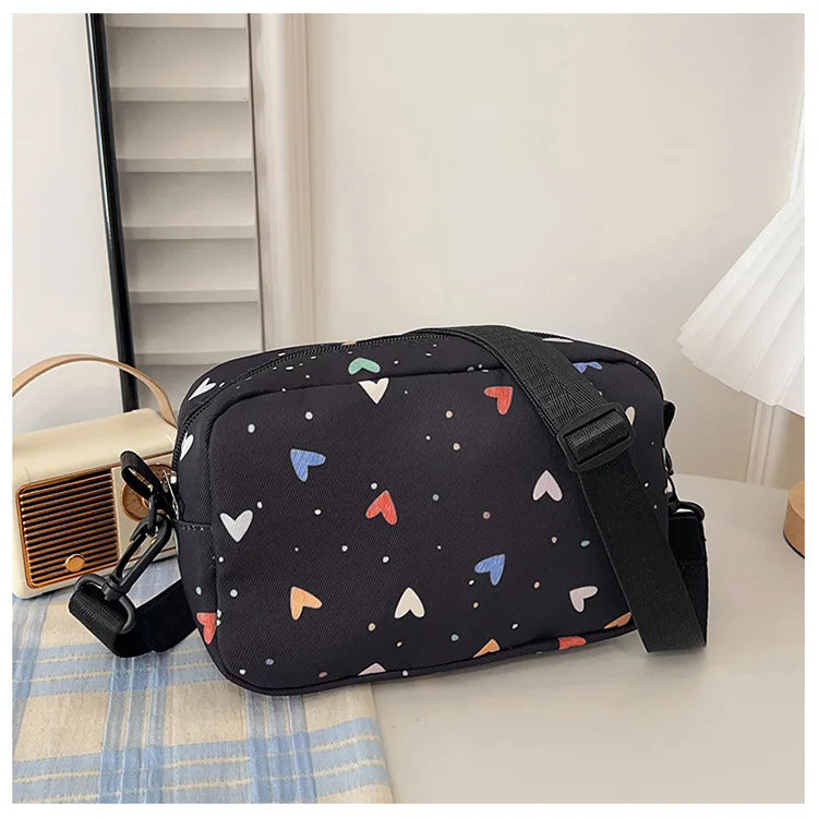 Nouvelle mode femmes sacs à bandoulière sac de maquillage femmes tendance Lingge broderie appareil photo sac à bandoulière conception Nylon petit sac de messager