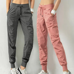Nouveaux pantalons de survêtement tissu cordon course Sport Joggers femmes séchage rapide athlétique gymnase Fitness avec deux poches latérales pantalons d'exercice